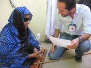 Mauritania. Ali's mother receiving news from her son with the help of an ICRC delegate.