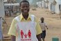 在科特迪瓦时，他就是一名红十字志愿者。在巴恩难民营中，他是红十字寻人志愿者的一员。