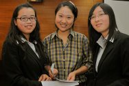 Law student Wang Qifan (centre) coached the team from China University of Political Science and Law at the 2010 IHL Moot Court Competition in Beijing.