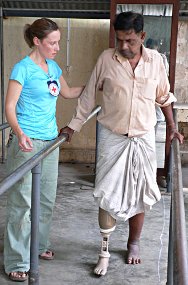 Jaffna Jaipur Centre for Disability Rehabilitation. An ICRC physiotherapist helps an amputee learn to walk on his artificial leg. The ICRC provides technical and financial support to the centre, which assists people in the north of Sri Lanka who have been injured by landmines and explosive remnants of war.