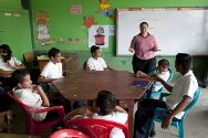 Teacher María Rivera with her students during a discussion as part of the Creating Humanitarian Spaces project. As seventh graders, they were the first to participate in the project at Los Pinos school.