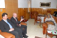 ICRC director-general Yves Daccord and Pascal Hundt, head of the ICRC's delegation in Sudan, speak with Amira Al Fadhil, minister of welfare and social security