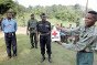 Photo, Democratic Republic of the Congo, 2001. National Red Cross first-aiders taking part in a training exercise for stretcher-bearers organized by the armed forces.