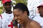 A woman in Port-au-Prince affected by the earthquake uses an ICRC satellite phone to reassure her relatives.
