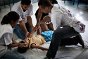 Nova Olandia favela, Rio de Janeiro, Brazil. Personnel from the Brazilian Red Cross and the ICRC teach first aid.