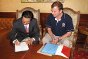 Wilson Airport, Kenya. The ICRC's head of the Nairobi regional delegation, Christoph Luedi and the Chinese Ambassador, Liu Guangyuan, sign off on the handover of 29 Chinese citizens to the Government of China.