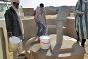 Displaced people from the Gao and Kidal areas fill their buckets at a water point installed by the ICRC.