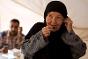 Shamaa rejoices as she finally hears the voice of her son in Damascus, and confirms that he is safe and sound. She regularly comes with her friends and neighbours to the ICRC tent to make a three-minute phone call. She says the ICRC service keeps her hoping for a quick end to the war. 