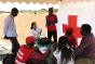 ICRC officials hold a meeting with Kenyan Red Cross volunteers to discuss issues related to the tracing programme. If there are unaccompanied children, the organization tries to locate their family and ensure that contact is restored. If conditions allow, the ICRC helps reunite the family.