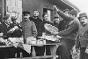 Distribution of parcels to French prisoners of war, Würzburg camp, Bavaria. In August 1914 the ICRC set up the International Prisoners of War Agency in Geneva, which centralized information and arranged for the delivery of parcels to prisoners.