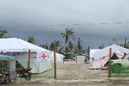 Dans la municipalité de Baganga. Unité de soins médicaux de base mise en place par le CICR après la destruction des installations médicales par le typhon.