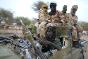Muzbat, Sudão, 2006. Combatentes do Exército de Liberação Sudanês. O comércio não regulado de armas e as violações cometidas com elas têm trágicas consequências. O Tratado sobre o Comércio de Armas de 2013 tem por finalidade proteger os civis ao regular a transferência de armas convencionais.