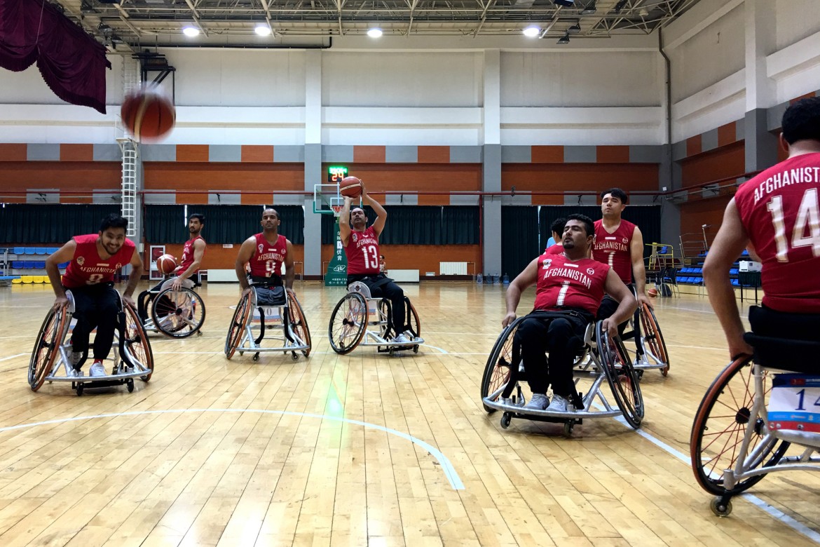 China Afghan wheelchair basketball team goes for slam dunk