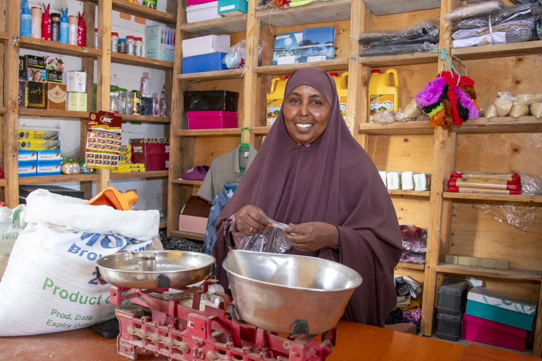 Photo of beneficiary in her ICRC supported shop