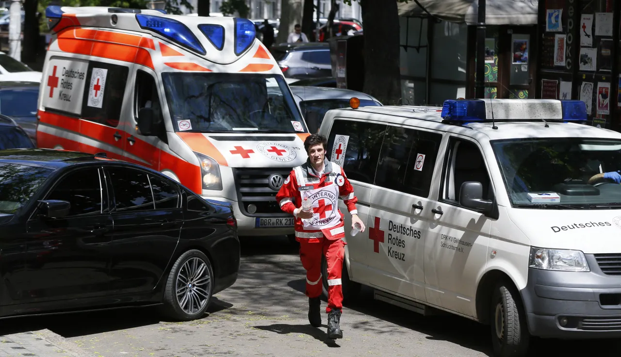 Red Cross cars on a road