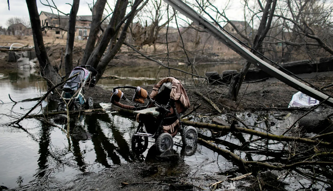 Strollers sit abandoned along a route people used to flee Irpin, Ukraine.