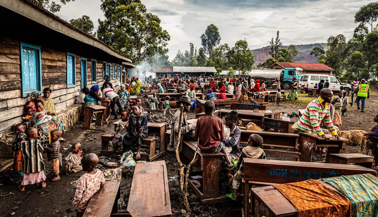 Internally displaced people have taken refuge in a school used as a makeshift camp in Kanyaruchinya, Congo. 
