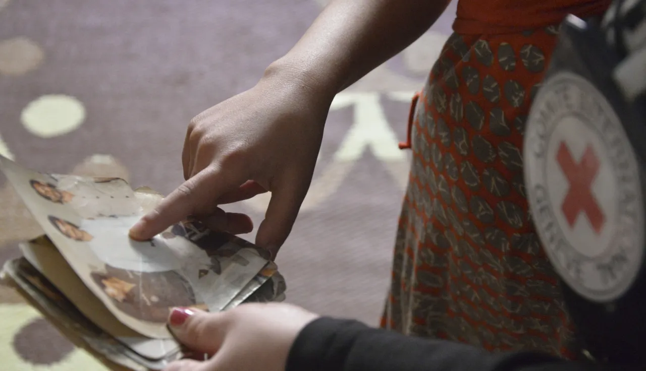 Photo from the archive with pictures of Iraqi missing persons.