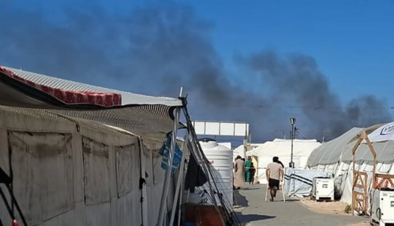 ICRC ILOT / Field Hospital Facts and Figures December 2024 Photo from the Red Cross Field Hospital in Rafah, Gaza. Smoke in the background