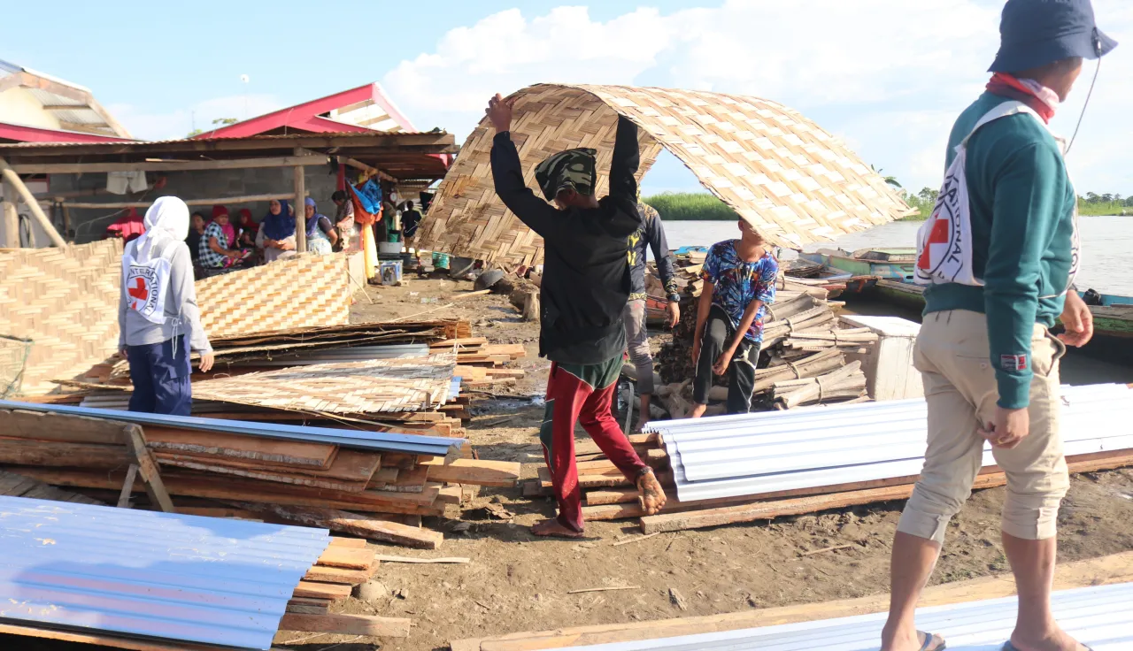 Unloading shelter kits for a remote conflict-affected community in Maguindanao del Sur, Philippines