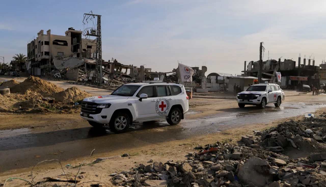 Red Cross vehicles enter the southern Gaza Strip heading northon January 19, 2025. The convoy is part of an operation to receive and transfer prisoners following the ceasefire.