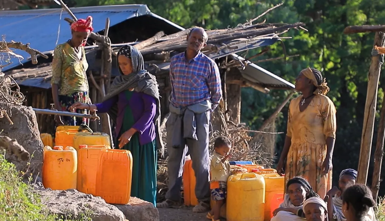 people collecting water from a water point in Lalibela town.