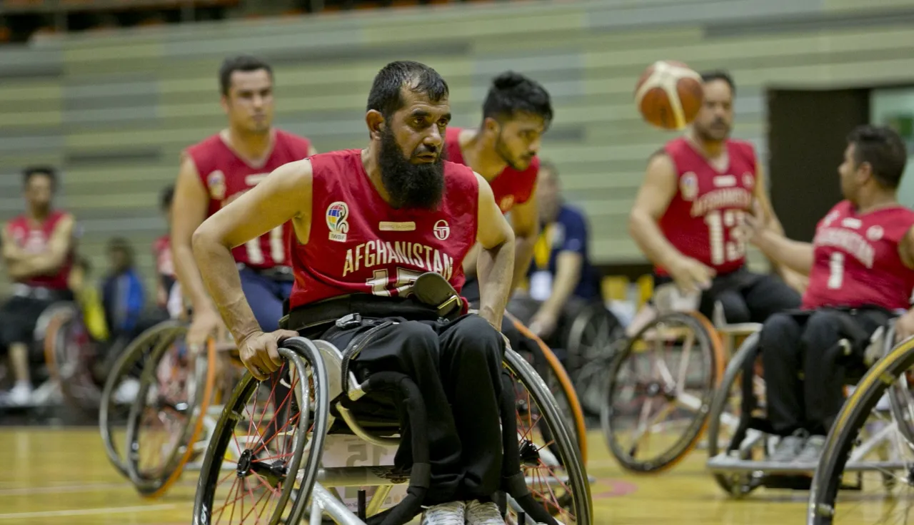 A man in a wheelchair plays basketball in Afghanistan.