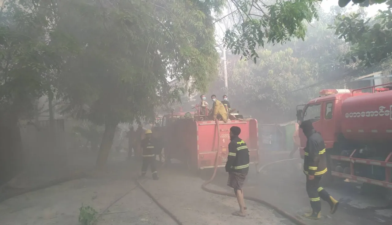 Firefighters in protective gear work to control a fire, in Mandalay, Myanmar, in response to the massive earthquakes which hit the country over the weekend.