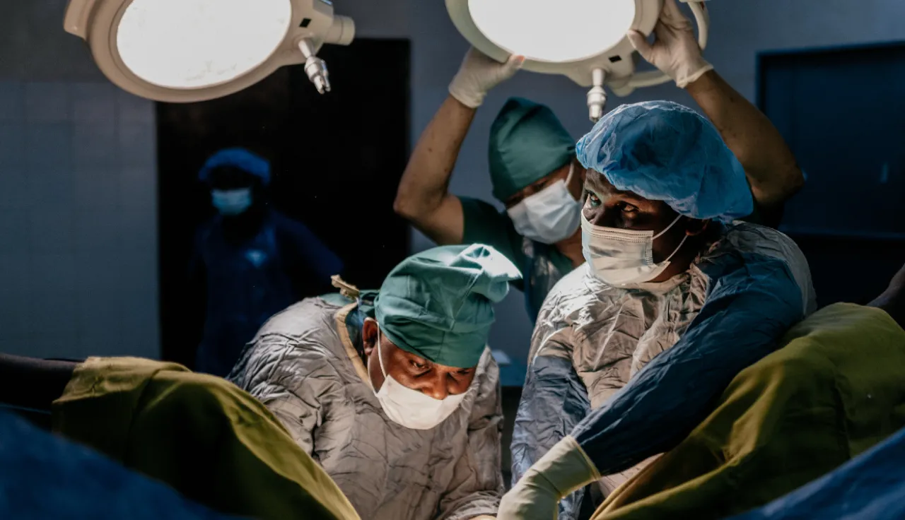 Doctors in surgery in an operating room.