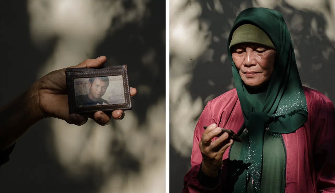 Gloria Berden holding her missing son's wallet