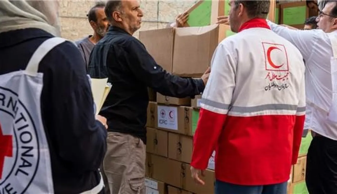 ICRC-and-Red-Crescent-staff-unload-boxes-of-humanitarian-supplies-from-a-truck--working-together-to-deliver-aid_.jpg