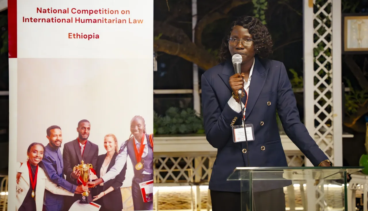 Nyamal making a speech at IHL Networking event organized by ICRC