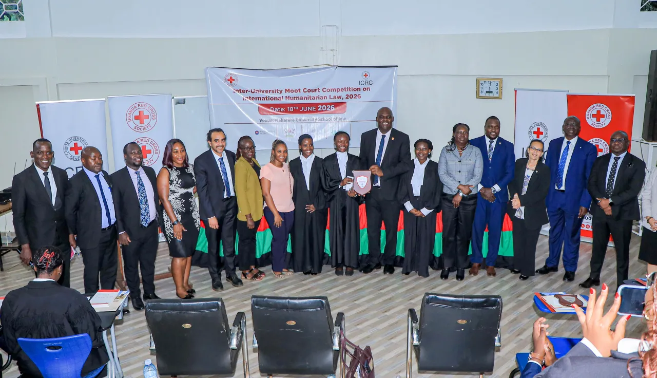 Group photo: In the middle Uganda Christian University students (2026 Winners) receiving their accolade from Justice Mike Chibita of the Supreme Court of the Republic of Uganda on 18 June 2026 at Makerere University, Uganda. Photo Credit: Patrick/URCS