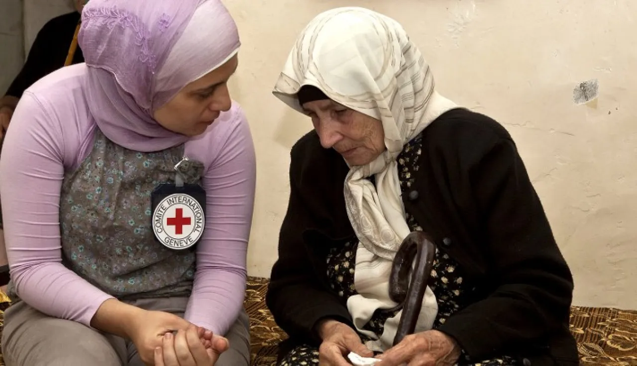 ICRC delegate in Lebanon comforting a woman