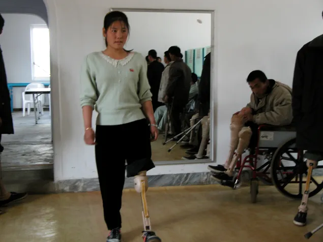 Songrim, 30 km from Pyongyang. Physical rehabilitation centre, learning to walk again.