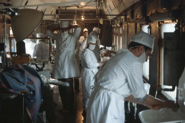 Medical team is pictured preparing for surgery in the surgical block of a hospital train in Aghdam.