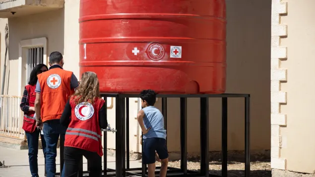 ICRC water tank at the Herjelleh shelter, Rural Damascus, Syria