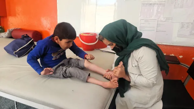 Bilal receives physiotherapy support at the physical rehabilitation centre in Kabul.
