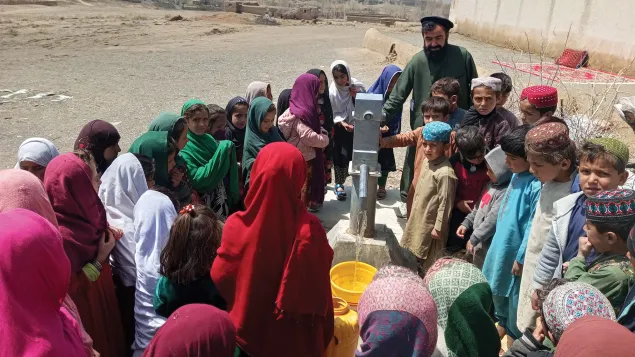 Children gather to collect drinking water in Khohseen village, Sayed Karam district, Paktia province