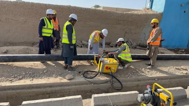 Construction workers during the installation of the new HDPE pipes in Kandahar city