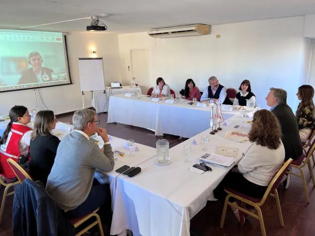 Gabriel Valladares speaks at COMs meeting at Buenos Aires.