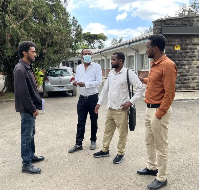 Doctors attending the training in brief discussion with ICRC representative.JPG