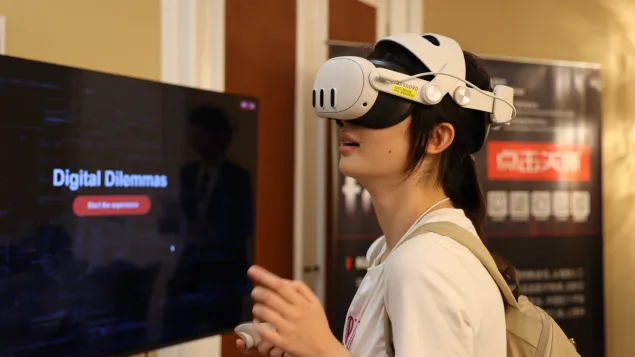 Participants participate in Digital Dilemmas immersive experience.