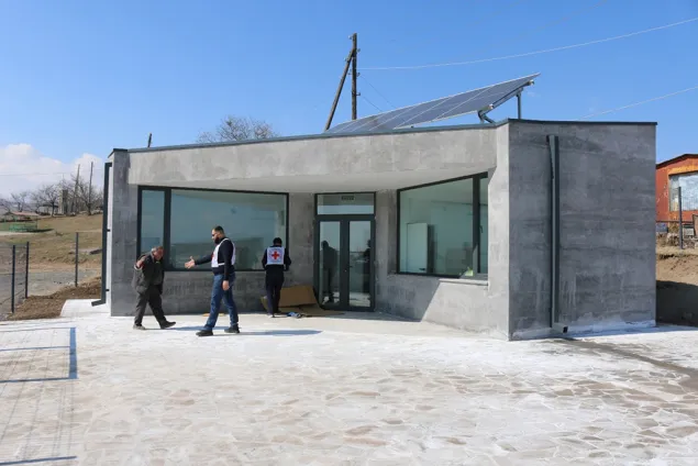 Inspecting the new medico-obstetric centre built by the ICRC in Aravus village.