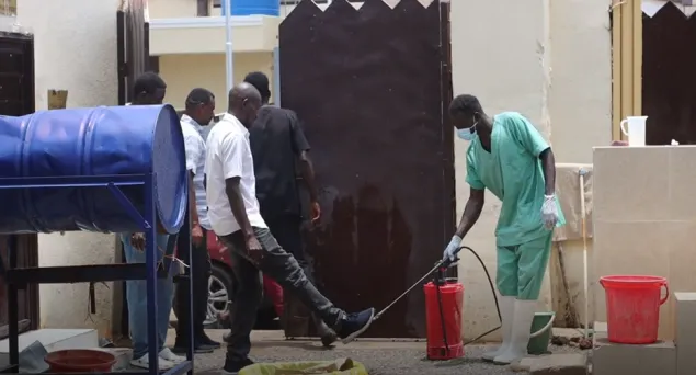 Sudan_disinfecting-hands-and-feet_cholera-treatment-centre-in-Gedaref-State2.png