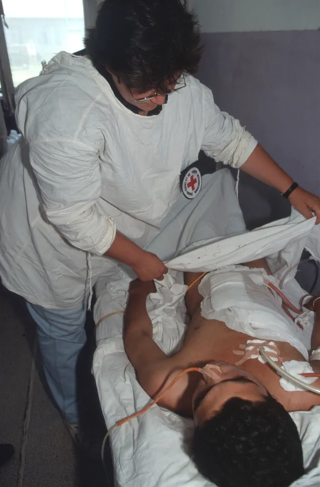  Barda. ICRC nurse conducts a thorough review of patient care.