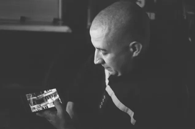 Serhii shows a video of the rescue at the 12-story apartment building in Kharkiv.