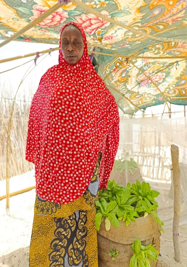 Une maman lumière avec un potager dans le Lac