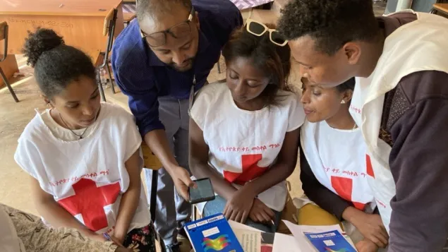 Ethiopian Red Cross Society volunteers study how to run a focus group discussion with communities, aimed understanding and reducing stigma against survivors of sexual violence, last year in Dembi Dollo, Oromia region
