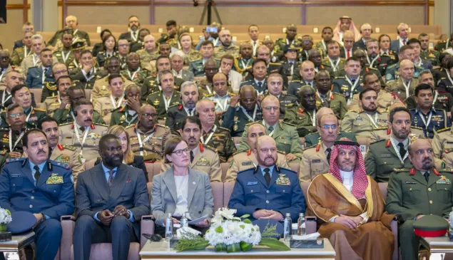 Participants to the opening of the 18th senior workshop on international rules governing military operations in Riyadh.